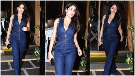 Janhvi Kapoor is a glam diva in a deep-neck denim jumpsuit for outing in Mumbai. (HT Photo/Varinder Chawla)