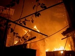 Russia-Ukraine War: A house burns after a Russian attack in Kherson, Ukraine.(AP) Russia-Ukraine War: A house burns after a Russian attack in Kherson, Ukraine.(AP)
