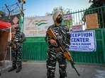 Security personnel guarding the complex containing EVMs of MCD election 2022 on the eve of counting day at Gole Market in New Delhi, (Photo by Sanchit Khanna/ Hindustan Times) Security personnel guarding the complex containing EVMs of MCD election 2022 on the eve of counting day at Gole Market in New Delhi, (Photo by Sanchit Khanna/ Hindustan Times)
