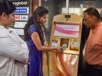 Hyderabad: A woman withdraws gold coins from Gold ATM, Begumpet, in Hyderabad. (PTI) Hyderabad: A woman withdraws gold coins from Gold ATM, Begumpet, in Hyderabad. (PTI)