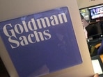 A trader works in the Goldman Sachs booth on the floor of the New York Stock Exchange. Rebecca Allen has sued the company for denying her promotions because of her race.(AP File Photo) A trader works in the Goldman Sachs booth on the floor of the New York Stock Exchange. Rebecca Allen has sued the company for denying her promotions because of her race.(AP File Photo)