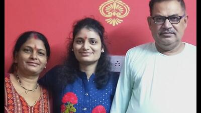 Neha Rani with her parents. (Sourced) Neha Rani with her parents. (Sourced)