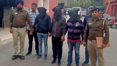 The three accused arrested in the ASI recruitment scam in the custody of Chandigarh Police on Tuesday. (HT Photo) The three accused arrested in the ASI recruitment scam in the custody of Chandigarh Police on Tuesday. (HT Photo)