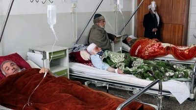 Afghanistan: Wounded men receive treatment at a hospital. (AP)