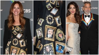 Julia Roberts honours friend George Clooney by wearing Moschino gown covered with his photos. (AP) Julia Roberts honours friend George Clooney by wearing Moschino gown covered with his photos. (AP)