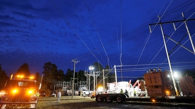 North Carolina: Duke Energy personnel work to restore power. (Reuters)