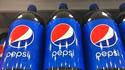A row of 2 liter Pepsi Cola line a shelf, Monday. (AP file)