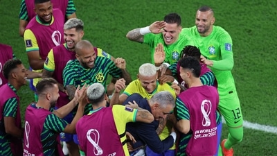 FIFA World Cup Qatar 2022 - Round of 16 - Brazil v South Korea - Brazil's Richarlison celebrates scoring their third goal with Brazil coach Tite and teammates REUTERS/Pedro Nunes (REUTERS)