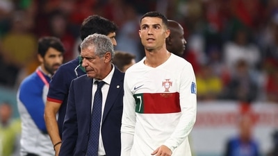 Portugal's Cristiano Ronaldo with coach Fernando Santos after being substituted (REUTERS)