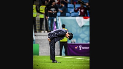 FIFA World Cup 2022: The image shows Japan manager Hajime Moriyasu bowing to fans in gratitude after their match with Croatia. (Screengrab)