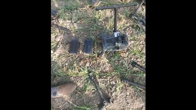 The damaged drone that was recovered from a field near Kalia village in Bhikhiwind sub division of Tarn Taran district on Tuesday morning after it was shot down on Monday night. (HT Photo) The damaged drone that was recovered from a field near Kalia village in Bhikhiwind sub division of Tarn Taran district on Tuesday morning after it was shot down on Monday night. (HT Photo)