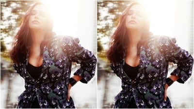Neha’s blazer featured floral patterns in shades of blue, black, green and red. Neha styled her tresses open in wavy curls with a side part as she posed for the pictures. (Instagram/@nehadhupia)