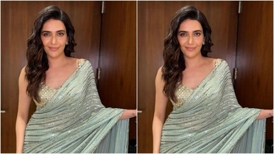 Styled by fashion stylist Ananya Arora, Karishma accessorised her look in silver ear studs, wore her tresses in wavy curls and decked up in nude eyeshadow, black eyeliner, black kohl, mascara-laden eyelashes, drawn eyebrows, contoured cheeks and a shade of nude lipstick. (Instagram/@karishmaktanna) Styled by fashion stylist Ananya Arora, Karishma accessorised her look in silver ear studs, wore her tresses in wavy curls and decked up in nude eyeshadow, black eyeliner, black kohl, mascara-laden eyelashes, drawn eyebrows, contoured cheeks and a shade of nude lipstick. (Instagram/@karishmaktanna)