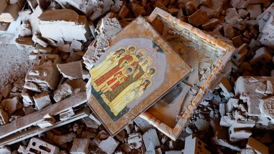 Religious artefacts were spotted amidst the debris of a building on the premises of Bakhmut's local church, which was damaged in shelling in the course of the Russia-Ukraine conflict in Donetsk, Russian-controlled Ukraine on December 5.(Alexander Ermochenko / REUTERS )
