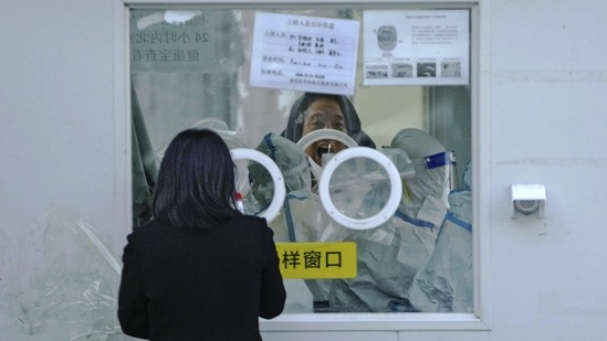 A view of a Covid-19 swab collection site in Beijing, on December 6. China reported 5,235 Covid related deaths as of December 5, but some experts have warned that toll could rise above 1 million if the exit is too hasty, Reuters reported.(Andy Wong / AP)