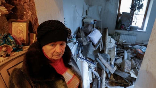In the aftermath of the shelling, a 70-year-old local resident Lyudmila shows her apartment inside a house heavily damaged in recent shelling in Donetsk, on December 6.&nbsp;(Alexander Ermochenko / REUTERS )