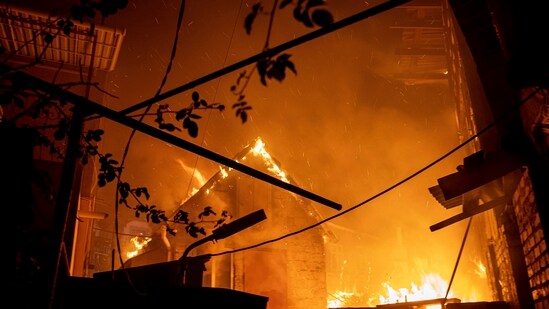 Russia-Ukraine War: A house burns after a Russian attack in Kherson, Ukraine.(AP)