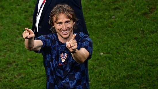 Croatia's midfielder Luka Modric celebrates after winning the Qatar 2022 World Cup round of 16 football match between Japan and Croatia