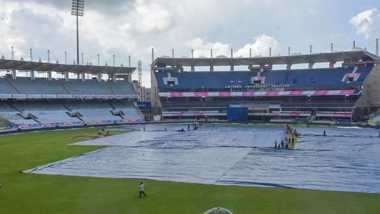 Groundsmen cover the playing field with plastic sheet in India | Image for representation (PTI) Groundsmen cover the playing field with plastic sheet in India | Image for representation (PTI)