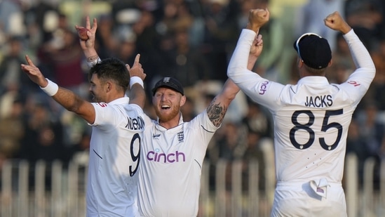 England's James Anderson, left, Ben Stokes, center, and Will Jacks celebrate after the dismissal of Pakistan's Haris Rauf during the fifth day of the first test cricket match between Pakistan and England, in Rawalpindi, Pakistan, Monday, Dec. 5, 2022. (AP Photo/Anjum Naveed)(AP) England's James Anderson, left, Ben Stokes, center, and Will Jacks celebrate after the dismissal of Pakistan's Haris Rauf during the fifth day of the first test cricket match between Pakistan and England, in Rawalpindi, Pakistan, Monday, Dec. 5, 2022. (AP Photo/Anjum Naveed)(AP)