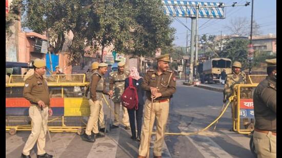 Police on guard on roads leading to the Shahi Eidgah Mosque in Mathura on Tuesday. (Sourced)