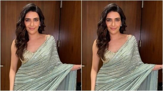 Styled by fashion stylist Ananya Arora, Karishma accessorised her look in silver ear studs, wore her tresses in wavy curls and decked up in nude eyeshadow, black eyeliner, black kohl, mascara-laden eyelashes, drawn eyebrows, contoured cheeks and a shade of nude lipstick.(Instagram/@karishmaktanna)