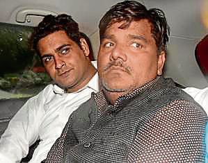 Former AAP councillor Tahir Hussain (right). (HT file) (HT_PRINT)