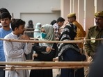 Voters seen standing in queues to cast their vote at a polling booth for the MCD elections 2022 in Delhi. (Photo by Sanchit Khanna/ Hindustan Times) Voters seen standing in queues to cast their vote at a polling booth for the MCD elections 2022 in Delhi. (Photo by Sanchit Khanna/ Hindustan Times)