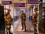 Ahmedabad: Border Security force (BSF) personnel stand guard at a strong room ahead of counting for the Gujarat Assembly elections, in Ahmedabad on Tuesday. (PTI) Ahmedabad: Border Security force (BSF) personnel stand guard at a strong room ahead of counting for the Gujarat Assembly elections, in Ahmedabad on Tuesday. (PTI)