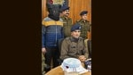 Chandigarh SSP Kuldeep Singh Chahal addressing the media after the arrest of drug smuggler Amit Sharma (masked) at the Police Headquarters in Sector 9 on Wednesday. (Keshav Singh/HT) Chandigarh SSP Kuldeep Singh Chahal addressing the media after the arrest of drug smuggler Amit Sharma (masked) at the Police Headquarters in Sector 9 on Wednesday. (Keshav Singh/HT)