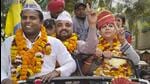 AAP leader Bobi (right) flashes a victory sign after winning from the Sultanpuri-A ward of MCD in New Delhi on Wednesday. (PTI) AAP leader Bobi (right) flashes a victory sign after winning from the Sultanpuri-A ward of MCD in New Delhi on Wednesday. (PTI)