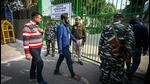 Security personnel guarding the complex containing EVMs for MCD elections 2022 on the eve of counting day, at Gole Market in New Delhi on Tuesday. (Sanchit Khanna/HT Photo) Security personnel guarding the complex containing EVMs for MCD elections 2022 on the eve of counting day, at Gole Market in New Delhi on Tuesday. (Sanchit Khanna/HT Photo)