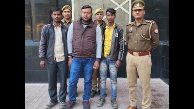 The three people arrested by GRP Aligarh on Wednesday. (HT photo)