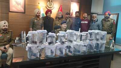 A team of DSP (detective) Talwinder Singh Gill conducted a raid at the hideout of the accused in Madhya Pradesh and seized 20 pistols and 40 magazines. (HT photo)