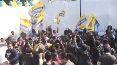 AAP workers dancing at party's office in Delhi (ANI) AAP workers dancing at party's office in Delhi (ANI)
