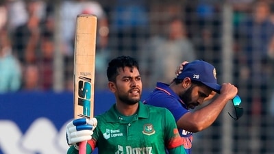 Bangladesh's Mehidy Hasan Miraz, who scored hundred runs raises his bat during the second one day international cricket match between Bangladesh and India in Dhaka, Bangladesh, Wednesday, Dec. 7, 2022. (AP Photo/Surjeet Yadav) (AP) Bangladesh's Mehidy Hasan Miraz, who scored hundred runs raises his bat during the second one day international cricket match between Bangladesh and India in Dhaka, Bangladesh, Wednesday, Dec. 7, 2022. (AP Photo/Surjeet Yadav) (AP)