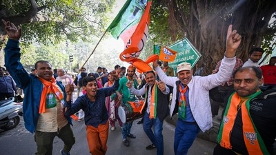BJP supporters celebrates outside a counting station for MCD Elections 2022 at Gole Market in New Delhi, India, December 7. (Photo by Sanchit Khanna/ Hindustan Times) (Hindustan Times) BJP supporters celebrates outside a counting station for MCD Elections 2022 at Gole Market in New Delhi, India, December 7. (Photo by Sanchit Khanna/ Hindustan Times) (Hindustan Times)