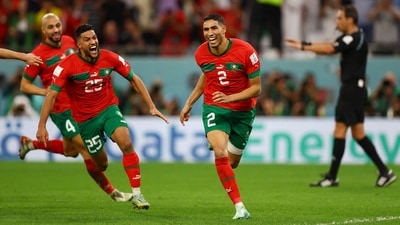 Morocco players celebrate after scoring the winning penalty after the tiebreakers against Spain at FIFA World Cup 2022 (REUTERS)