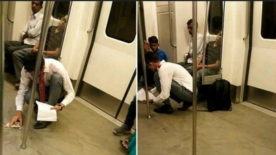 Man cleans Delhi metro floor. (Linkedin/@AshuSingh) Man cleans Delhi metro floor. (Linkedin/@AshuSingh)