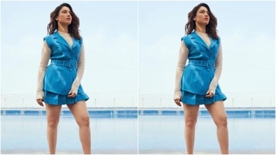 Styled by fashion stylist Shaleena Nathani, Tamannaah wore her tresses open in wavy curls with a side part as she posed for the pictures with the backdrop of a swimming pool. (Instagram/@tamannaahspeaks) Styled by fashion stylist Shaleena Nathani, Tamannaah wore her tresses open in wavy curls with a side part as she posed for the pictures with the backdrop of a swimming pool. (Instagram/@tamannaahspeaks)