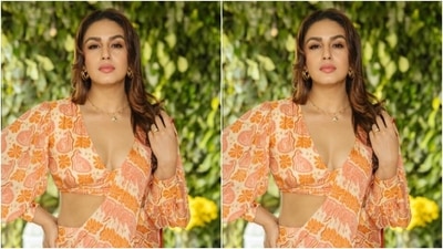 Huma slayed fashion goals for festive mornings as she decked up in a chiffon saree and made us drool. Huma picked a white and orange chiffon saree featuring floral patterns in shades of orange and pink. She wore the saree with pleats on one shoulder. (Instagram/@iamhumaq) Huma slayed fashion goals for festive mornings as she decked up in a chiffon saree and made us drool. Huma picked a white and orange chiffon saree featuring floral patterns in shades of orange and pink. She wore the saree with pleats on one shoulder. (Instagram/@iamhumaq)