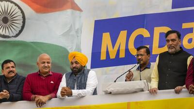 Delhi chief minister and AAP convener Arvind Kejriwal addresses party workers after AAP crossed the majority mark in the MCD polls, at the party headquarters in New Delhi on Wednesday. (PTI)