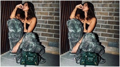 Regarding the details of Shibani's outfit, the jacket is from Dhruv Kapoor's clothing label, the pants are from The Attico, the top is by Rick Owens, and the bag is by Balenciaga. Celebrity stylist Kajal Patil styled Shibani in the voguish fit. (Instagram) Regarding the details of Shibani's outfit, the jacket is from Dhruv Kapoor's clothing label, the pants are from The Attico, the top is by Rick Owens, and the bag is by Balenciaga. Celebrity stylist Kajal Patil styled Shibani in the voguish fit. (Instagram)