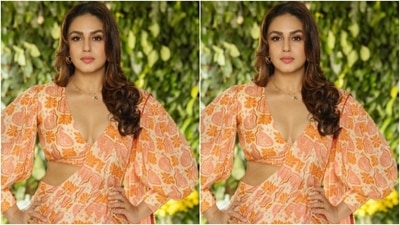 In a sleek neck chain, golden hoop earrings and a finger ring, Huma completed her look for the day. Styled by fashion stylist Sanam Ratansi, Huma wore her tresses open in a dewy wavy look. (Instagram/@iamhumaq) In a sleek neck chain, golden hoop earrings and a finger ring, Huma completed her look for the day. Styled by fashion stylist Sanam Ratansi, Huma wore her tresses open in a dewy wavy look. (Instagram/@iamhumaq)