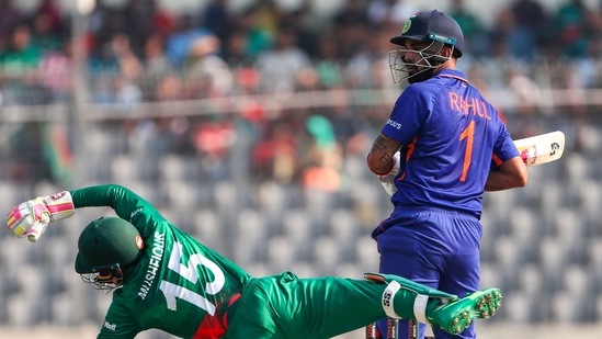 Bangladesh's Mushfiqur Rahim tries to field a shot of India's KL Rahul(AP) Bangladesh's Mushfiqur Rahim tries to field a shot of India's KL Rahul(AP)
