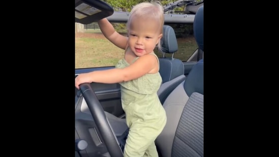 Little girl is surprised with her own mini car.(Instagram/@jordanflom)