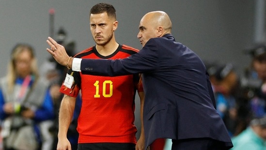 Belgium coach Roberto Martinez gives instructions to Eden Hazard before he comes on as a substitute (REUTERS)