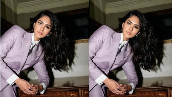 Mrunal decked up in a white shirt, a silver tie, and layered it with a lavender suit. She teamed her ensemble with a matching pair of lavender formal trousers.(Instagram/@mrunalthakur)