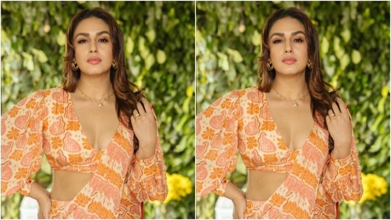 Huma killed fashion targets for carnival morning when she wore a chiffon saree and left us drooling.  Huma opted for a white and orange chiffon saree with floral motifs in shades of orange and pink.  She wears a saree with pleats on one shoulder.  (Instagram/@iamhumaq)