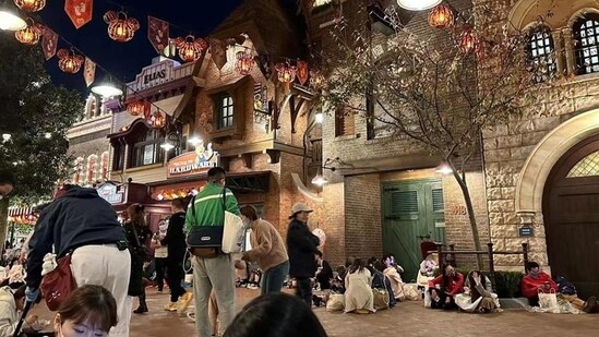 Covid In China: People sit inside the Shanghai Disney Resort.